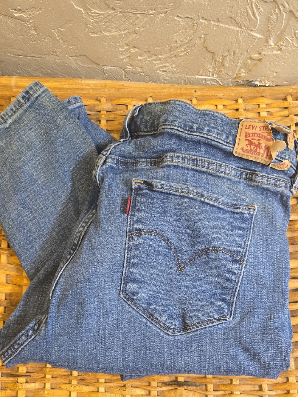 Levi's Blue Denim 311 Skinny Shaping Jeans with Tan Leather Patch and Red Print